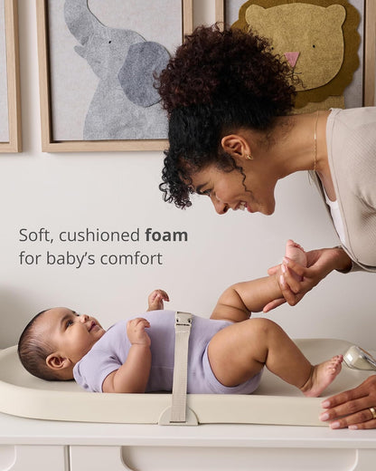 Baby Changing Pad Nursery Style Wipe-Clean Contoured with Cushioned Foam, Non-Skid Base, Built-in Safety Belt & Tuck-Away Toy Bar Fits Standard Changing Tables, Oat