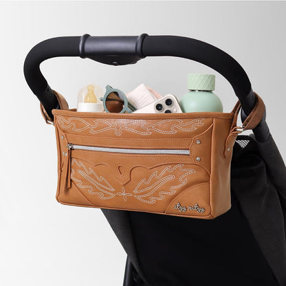 Itzy Ritzy Adjustable Stroller Caddy and Organizer Bag Featuring Front Zippered Pocket, 2 Built-In Interior Pockets & Adjustable Straps to Fit Nearly Any Stroller (Coffee and Cream)