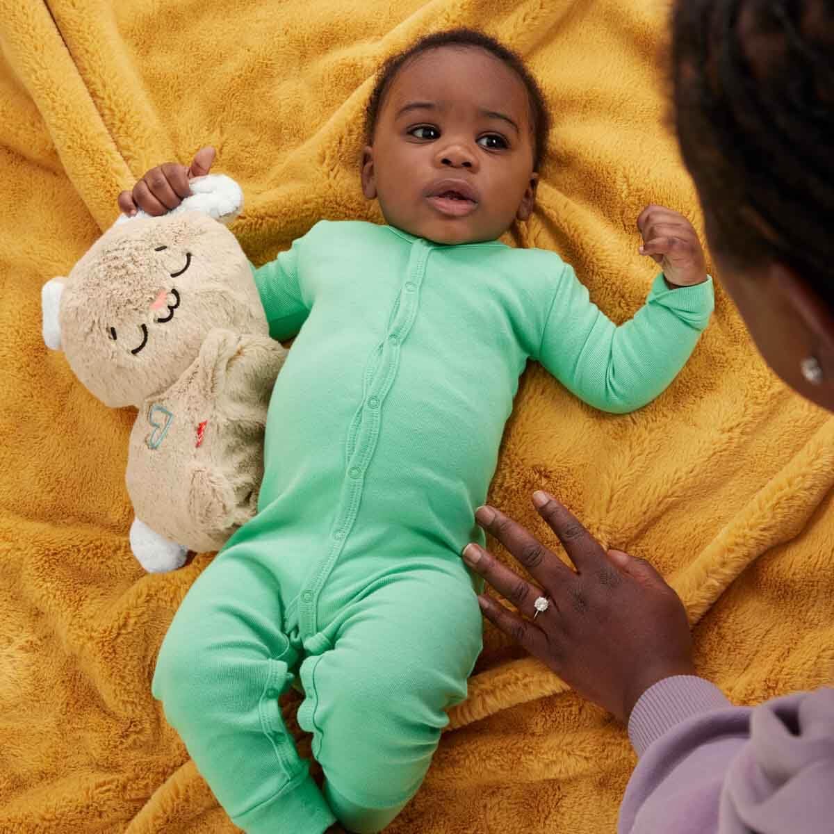 FISHER-PRICE BABY Toy Soothe 'n Snuggle Otter Portable Plush Sound Machine with Music Lights & Breathing Motion for Newborns 0+ Months
