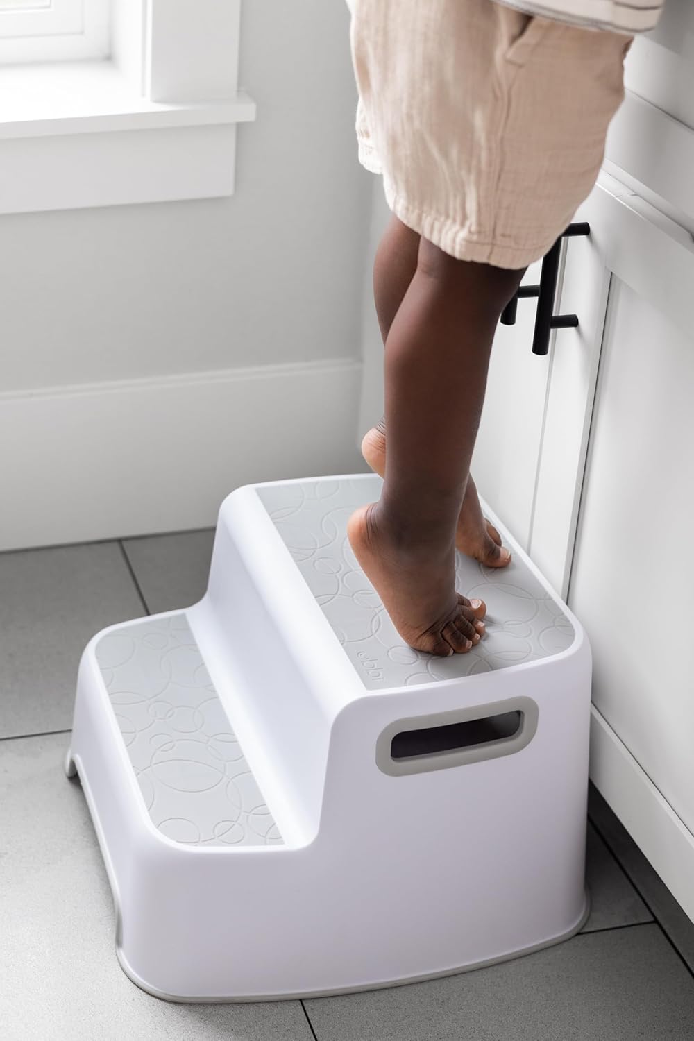 Ubbi Multi-Use Potty and Utility Hook, No Hardware Or Installation Needed, Durable and Sturdy to Hang Over Toilet Tank Or Door, Polypropylene, White