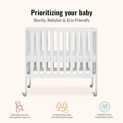 Dream On Me Jett Mini Folding Baby Crib in White, GreenGuard Gold & BSA, Lightweight & Portable, Patented Flat Folding System for Small Spaces & Travel, 1.5” Mattress Pad, 3 Heights, Safe Wheels