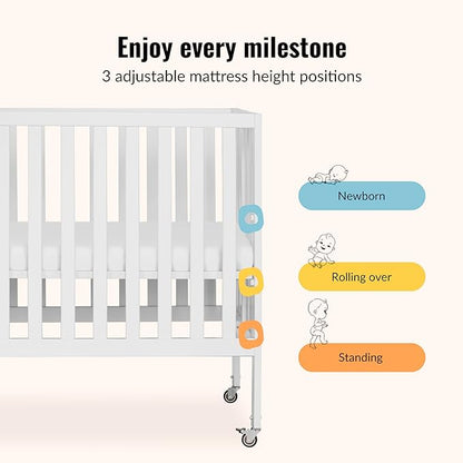 Dream On Me Jett Mini Folding Baby Crib in White, GreenGuard Gold & BSA, Lightweight & Portable, Patented Flat Folding System for Small Spaces & Travel, 1.5” Mattress Pad, 3 Heights, Safe Wheels