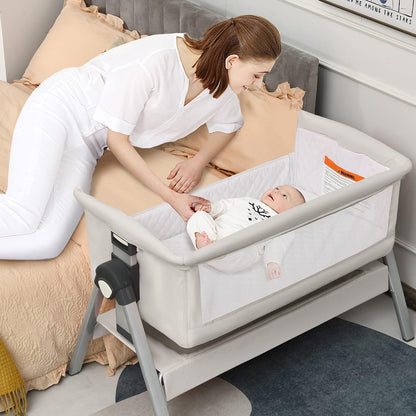 INFANS Baby Bassinet Bedside Crib, Newborn Sleeper w/Large Storage Basket, Adjustable Heights, Detachable &Washable Mattress, Breathable Mesh, Straps, Easy Moving Bed Side (Pink)