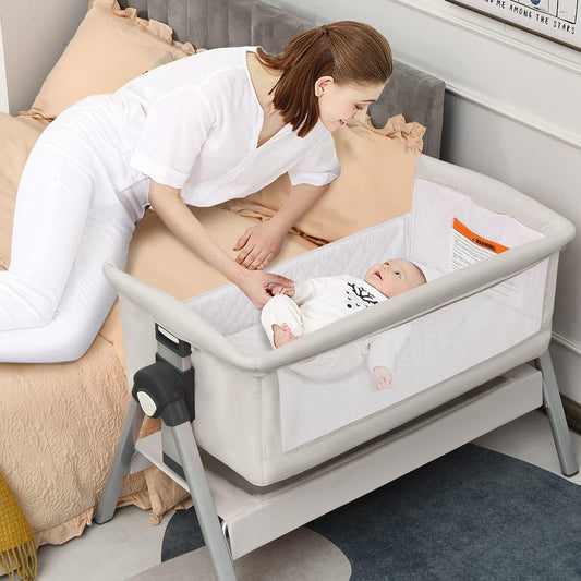 INFANS Baby Bassinet Bedside Crib, Newborn Sleeper w/Large Storage Basket, Adjustable Heights, Detachable &Washable Mattress, Breathable Mesh, Straps, Easy Moving Bed Side (Pink)