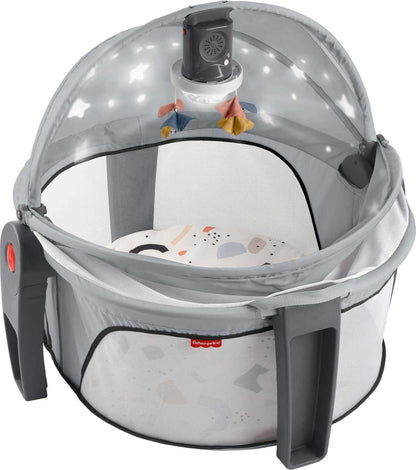 Fisher-Price Portable Baby Bassinet and Play Space Deluxe On-the-Go Projection Dome with Lights Music and Canopy, Cool Hues
