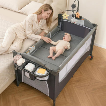 INFANS Pack and Play, 5 in 1 Baby Bedside Sleeper with Bassinet, Diaper Changer, Mattress, Carry Bag, Music Box Hanging Toys, Foldable Bedside Crib, Portable Playard for Newborn Toddlers (Gray)