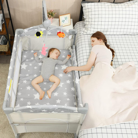 HONEY JOY Pack and Play with Bassinet, 5-in-1 Baby Bedside Sleeper w/Diaper Changing Table & Storage Bag, Toy Arch & Music Box, Detachable Side Rail, Portable Baby Play Yard w/Carry Bag(Gray)