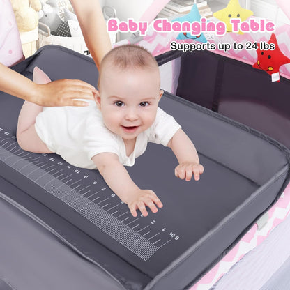 BABY JOY 4 in 1 Pack and Play, Portable Baby Playard with Bassinet, Side Zipper Door, Changing Table, Indoor Outdoor Travel Nursery Center w/Hanging Bar, Lockable Wheels, Carry Bag