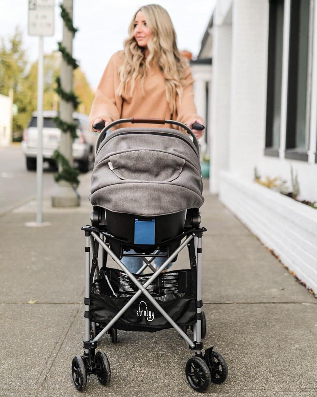 Strolyy Universal Infant Car Seat Carrier. Adds Wheels to Any car seat. Compact & Lightweight. Fits Everywhere.