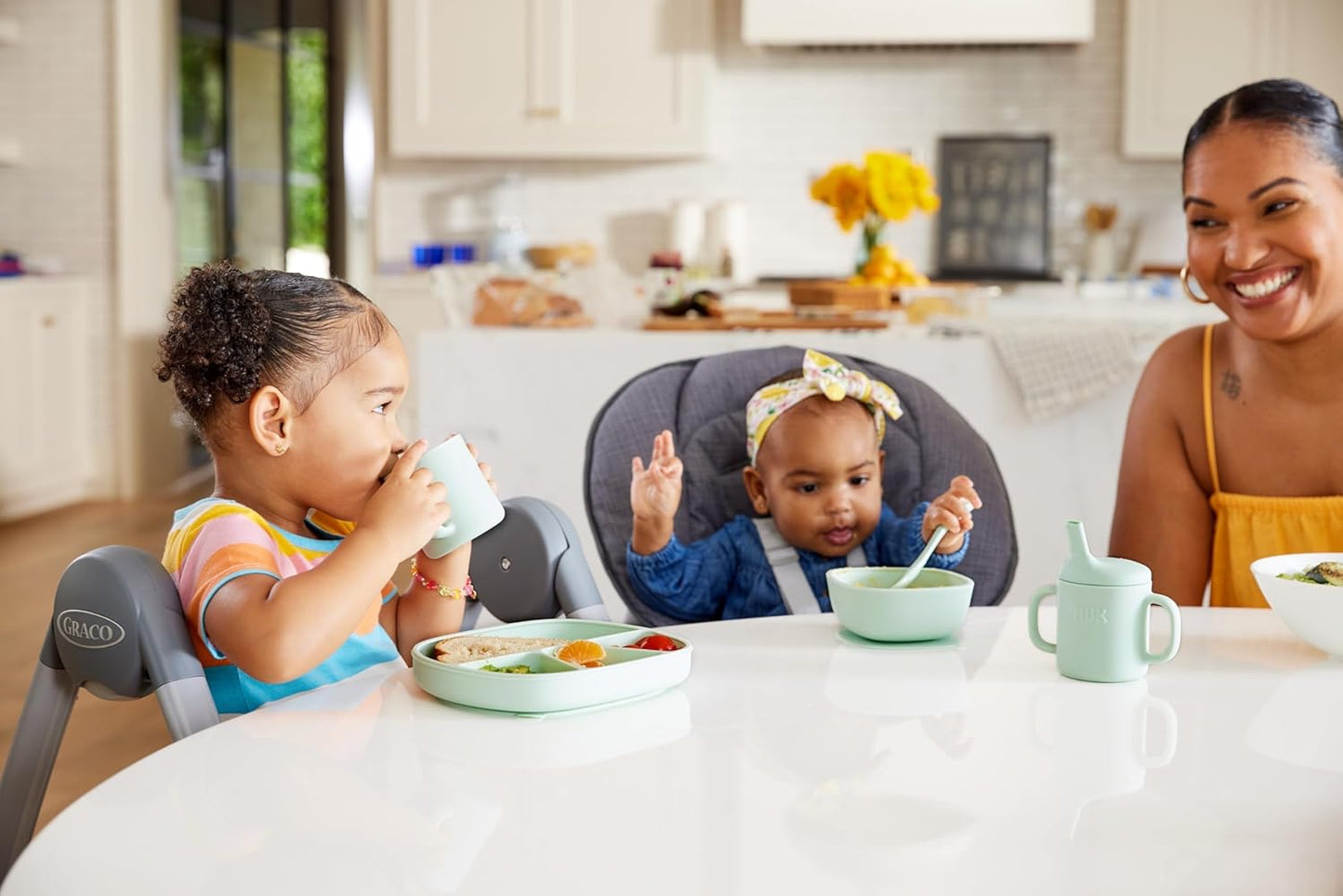 NUK Silicone Baby Tableware Bundle, Includes 1 Plate, 1 Bowl, 1 Cup, & 1 Spoon, Durable Suction Feature Helps Reduce Spills, Microwave-Safe, BPA-Free