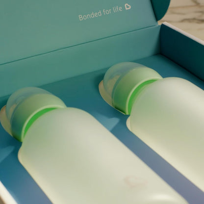 Munchkin Bond Silicone Coated Glass Baby Bottles - Anti-Colic Feeding System with Natural Feel Nipples, 4 Ounce, 2 Pack, White