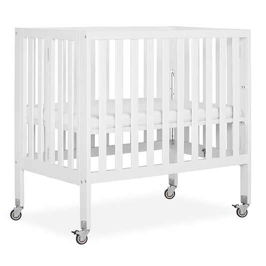 Dream On Me Jett Mini Folding Baby Crib in White, GreenGuard Gold & BSA, Lightweight & Portable, Patented Flat Folding System for Small Spaces & Travel, 1.5” Mattress Pad, 3 Heights, Safe Wheels