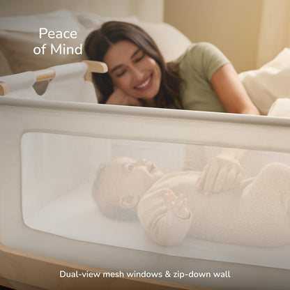 SnuzPod 5 Bedside Bassinet for Baby - Newborn Bed with Zip Down Breathable Windows, Rocking Bedside Sleeper with Lift-Off Bassinet, Portable 3-in-1 Baby Cradle with Wheels & Mattress, Natural