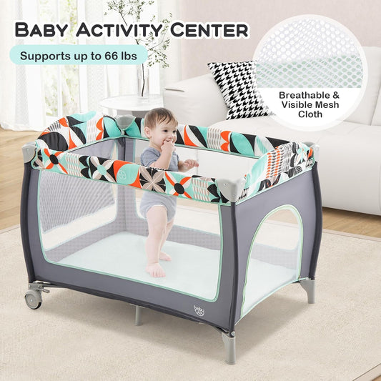 BABY JOY 4 in 1 Pack and Play, Portable Baby Playard with Bassinet, Side Zipper Door, Changing Table, Indoor Outdoor Travel Nursery Center w/Hanging Bar, Lockable Wheels, Carry Bag