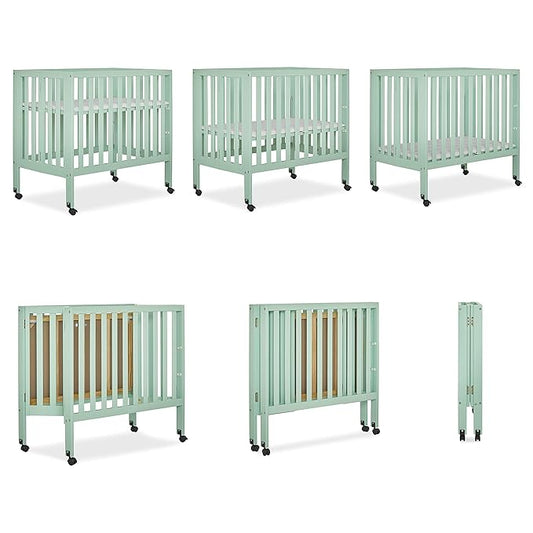 Dream On Me Jett Mini Folding Baby Crib in Mint, GreenGuard Gold & BSA, Lightweight & Portable, Patented Flat Folding System for Small Spaces & Travel, 1.5” Mattress Pad, 3 Heights, Safe Wheels