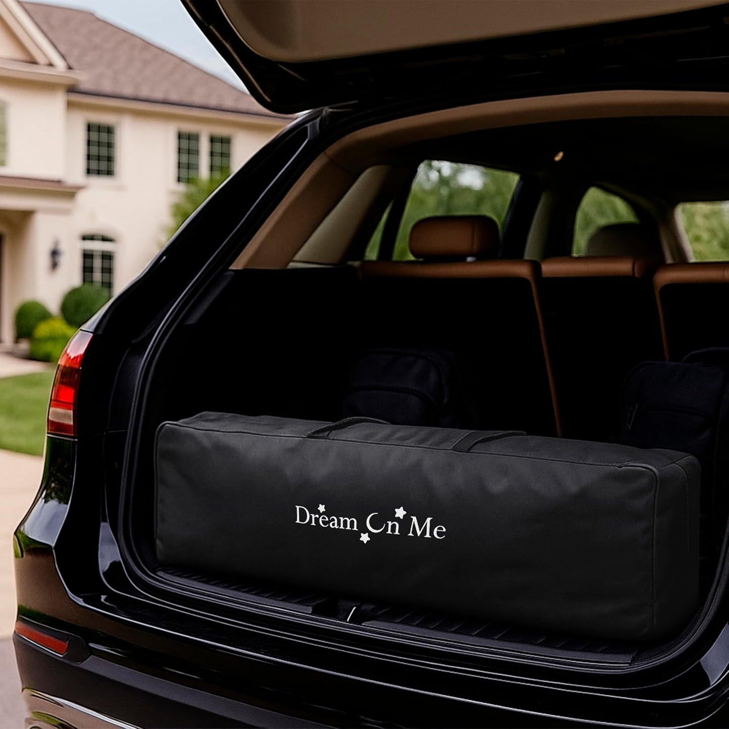 Dream On Me EZGo Portable Playard, Tool-Free Assembly, Easy One-Step Fold, Breathable Mesh Sides, Removable Mattress Pad & Smooth Locking Wheels, Travel Carry Bag Included – Black & White