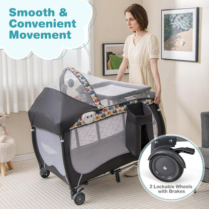 HONEY JOY Pack and Play with Bassinet, 4-in-1 Portable Baby Playard with Changing Table, Net & Cute Toys, Diaper Storage Bag, Music Box, Wheels with Brake, Foldable Newborn Play Yard w/Carry Bag