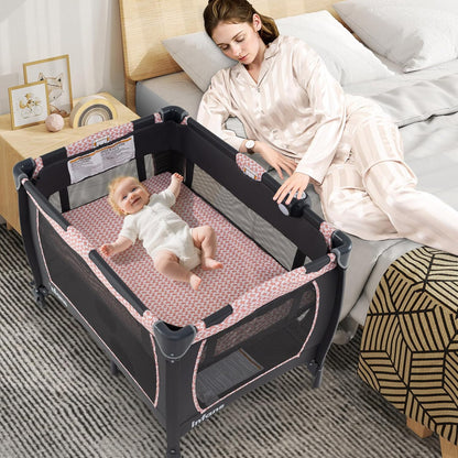INFANS 4 in 1 Pack and Play, Portable Nursery Center for Baby Kid Infant, Travel Playard with Bassinet, Mattress, Diaper Changer, Bag, Music Box, Storage Basket (Pink)