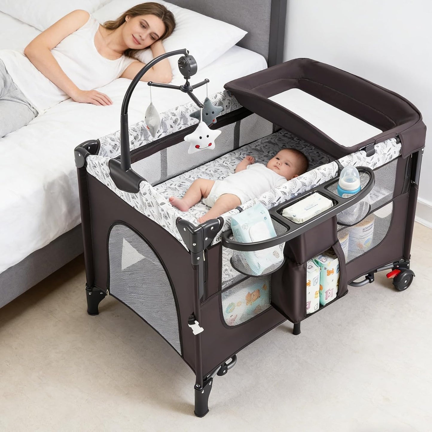 5-in-1 Baby Bassinet Bedside Sleeper with Swing Tube Converts to Cradle, Baby Crib with Mattress, Detachable Diaper Changer, Mosquito Net and Toy - Black