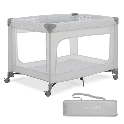 Dream On Me EZGo Portable Playard, Tool-Free Assembly, Easy One-Step Fold, Breathable Mesh Sides, Removable Mattress Pad & Smooth Locking Wheels, Travel Carry Bag Included – Black & White