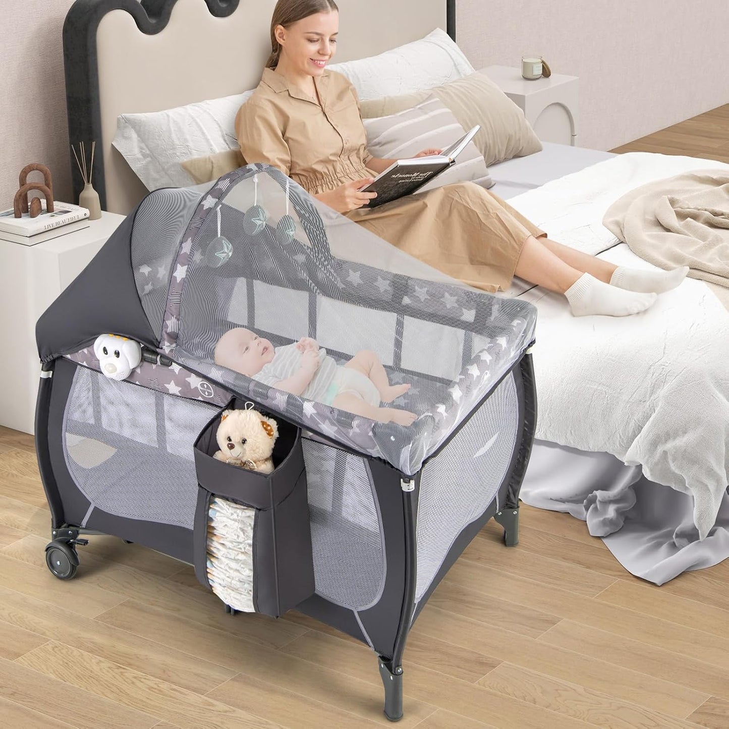 HONEY JOY Pack and Play with Bassinet, 4-in-1 Portable Baby Playard with Changing Table, Net & Cute Toys, Diaper Storage Bag, Music Box, Wheels with Brake, Foldable Newborn Play Yard w/Carry Bag