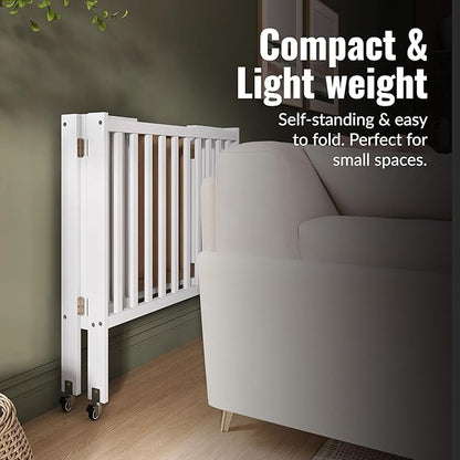 Dream On Me Jett Mini Folding Baby Crib in White, GreenGuard Gold & BSA, Lightweight & Portable, Patented Flat Folding System for Small Spaces & Travel, 1.5” Mattress Pad, 3 Heights, Safe Wheels