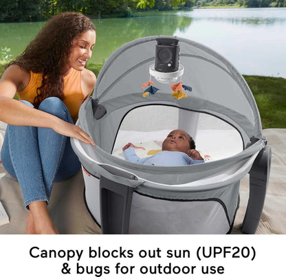 Fisher-Price Portable Baby Bassinet and Play Space Deluxe On-the-Go Projection Dome with Lights Music and Canopy, Cool Hues