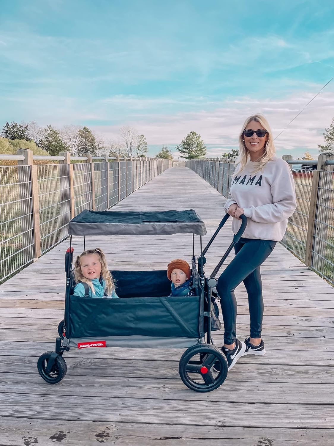 Radio Flyer City Luxe Stroll 'N Wagon, for Ages 1+, 3-in-1 Push or Pull, with Bench Mode, Easy Fold, UV Canopy, 5-Point Harnesses, Front Caster Wheels & 12" Rear Wheels, Stroller Wagon for Kids