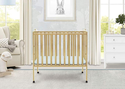 Delta Children Folding Portable Mini Baby Crib with 1.5-inch Mattress - Greenguard Gold Certified, Natural