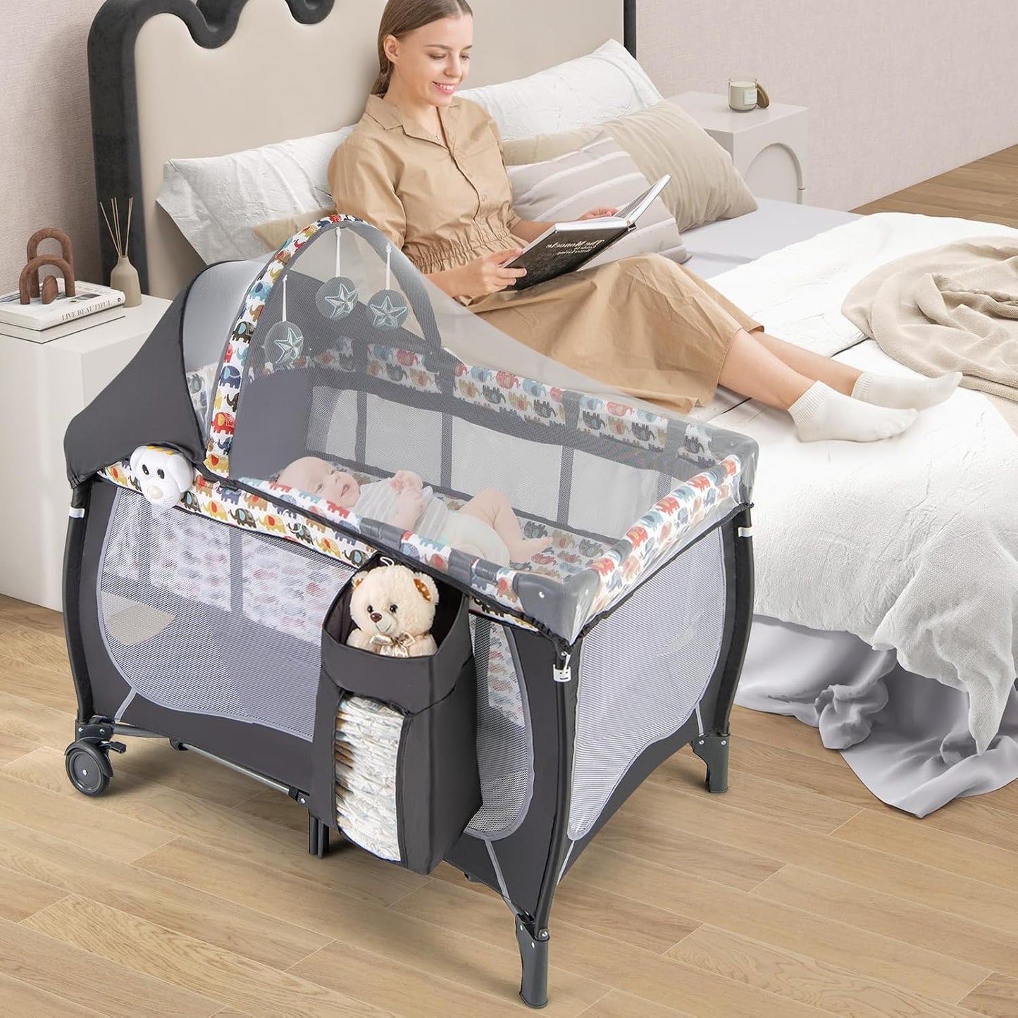 HONEY JOY Pack and Play with Bassinet, 4-in-1 Portable Baby Playard with Changing Table, Net & Cute Toys, Diaper Storage Bag, Music Box, Wheels with Brake, Foldable Newborn Play Yard w/Carry Bag