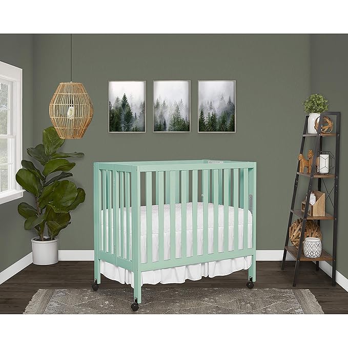 Dream On Me Jett Mini Folding Baby Crib in Mint, GreenGuard Gold & BSA, Lightweight & Portable, Patented Flat Folding System for Small Spaces & Travel, 1.5” Mattress Pad, 3 Heights, Safe Wheels