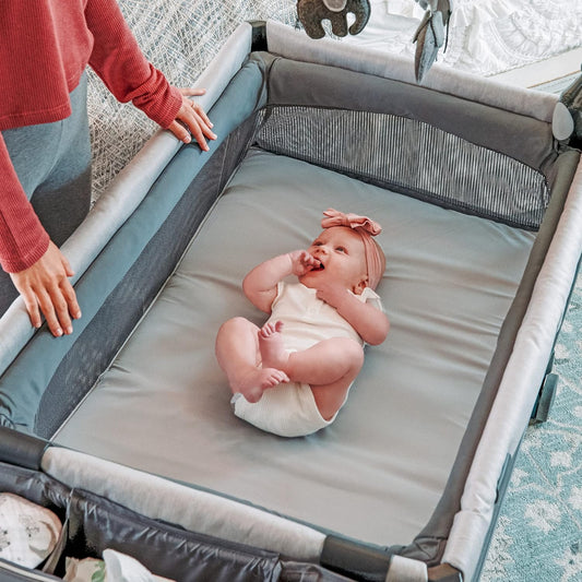 Chicco Lullaby Zip All-in-One Portable Playard, Infant Bassinet and Changer, Electronic Toy Bar, Toddler Playard, Travel Friendly | Driftwood/Grey