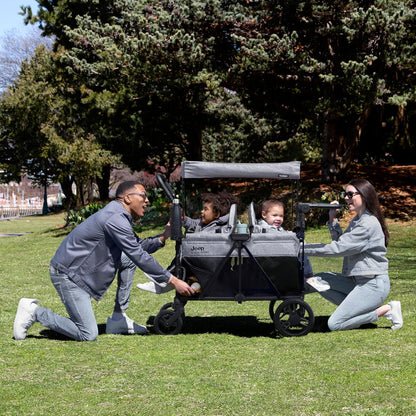 Jeep Aries Stroller Wagon by Delta Children Premium Wagon for 2 Kids with Convertible Seats, Adjustable Push/Pull Handles, Removable Canopy & Flat Fold - Greenguard Gold Certified, Black/Green
