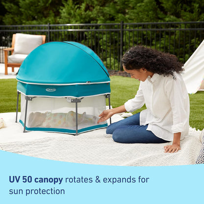 Graco® Lite Traveler 4 in 1 Playard with 4 Modes, Bedside Bassinet, Toddler Playpen, Free Play and Slumber Tent Mode, Lightweight Portable Playard with Canopy and Carry Bag
