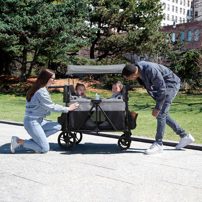Jeep Aries Stroller Wagon by Delta Children Premium Wagon for 2 Kids with Convertible Seats, Adjustable Push/Pull Handles, Removable Canopy & Flat Fold - Greenguard Gold Certified, Black/Green