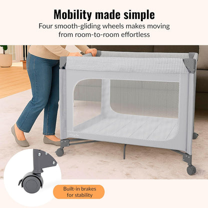 Dream On Me EZGo Portable Playard, Tool-Free Assembly, Easy One-Step Fold, Breathable Mesh Sides, Removable Mattress Pad & Smooth Locking Wheels, Travel Carry Bag Included – Black & White