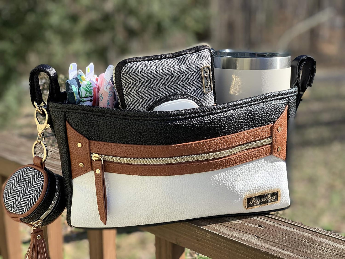 Itzy Ritzy Adjustable Stroller Caddy and Organizer Bag Featuring Front Zippered Pocket, 2 Built-In Interior Pockets & Adjustable Straps to Fit Nearly Any Stroller (Coffee and Cream)
