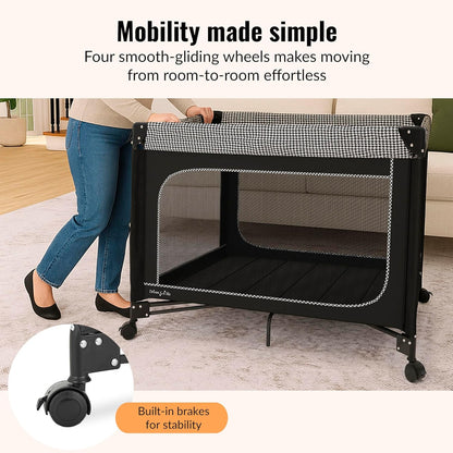Dream On Me EZGo Portable Playard, Tool-Free Assembly, Easy One-Step Fold, Breathable Mesh Sides, Removable Mattress Pad & Smooth Locking Wheels, Travel Carry Bag Included – Black & White