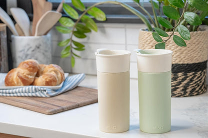Ogden Ceramic Travel Mug with Splash-Resistant Slider Lid and Protective Silicone Boot, Perfect for Coffee or Tea, BPA Free, Dishwasher Safe, Gray, 16 oz, 758-0438-040 | Splash-resistant ceramic travel mug with slider lid and protective silicone sleeve.