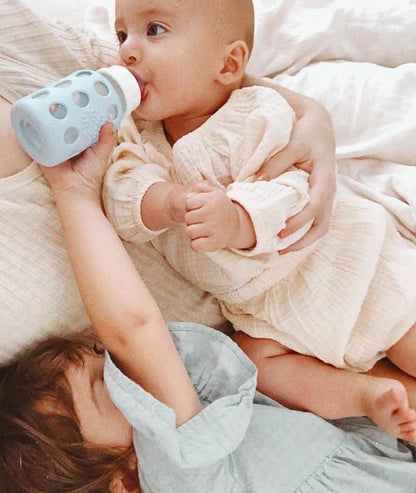 Glass Baby Bottle BPA Free | Protective Silicone Sleeve | 4 oz Pack of 2 | Cantaloupe, Banana - Colors B