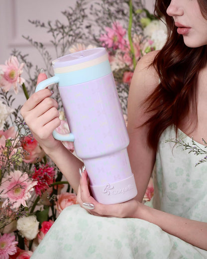 40 oz Insulated Tumbler with Handle and Push-Button Straw Lid, Stainless Steel Travel Cup for Gym Office, Leakproof, BPA-Free, Cup Holder Friendly, Bow Silicone Boot, Purple (Light Lilac)