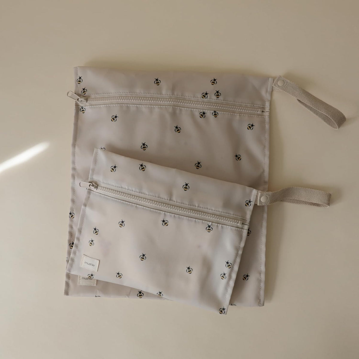Water Resistant Wet Bags | Large & Small Reusable Storage Bag for Baby Items and Travel | Zippered Pockets with Handle | Machine Washable, Set of 2 (Bees)