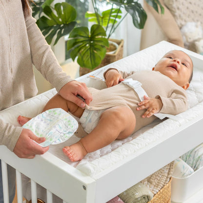 Contoured Changing Pad – Includes Waterproof Changing Liner and Safety Fastening Strap with Quick-Release Buckle