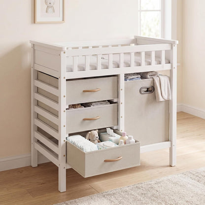 Wooden Baby Changing Table with Comfy Changing Pad, 3 Fabric Drawers, Laundry Hamper, Safety Belt, Diaper Station Dresser for Nursery Infant (White)