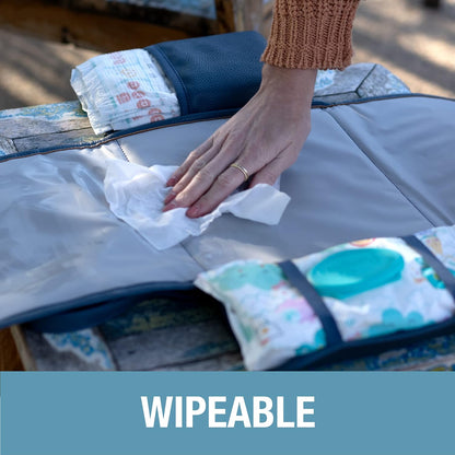 Portable Baby Changing Pad Clutch with Wristlet - Premium Foldable Water Resistant Diaper Changing Mat with Storage Pockets for Diapers and Wipes - Brown